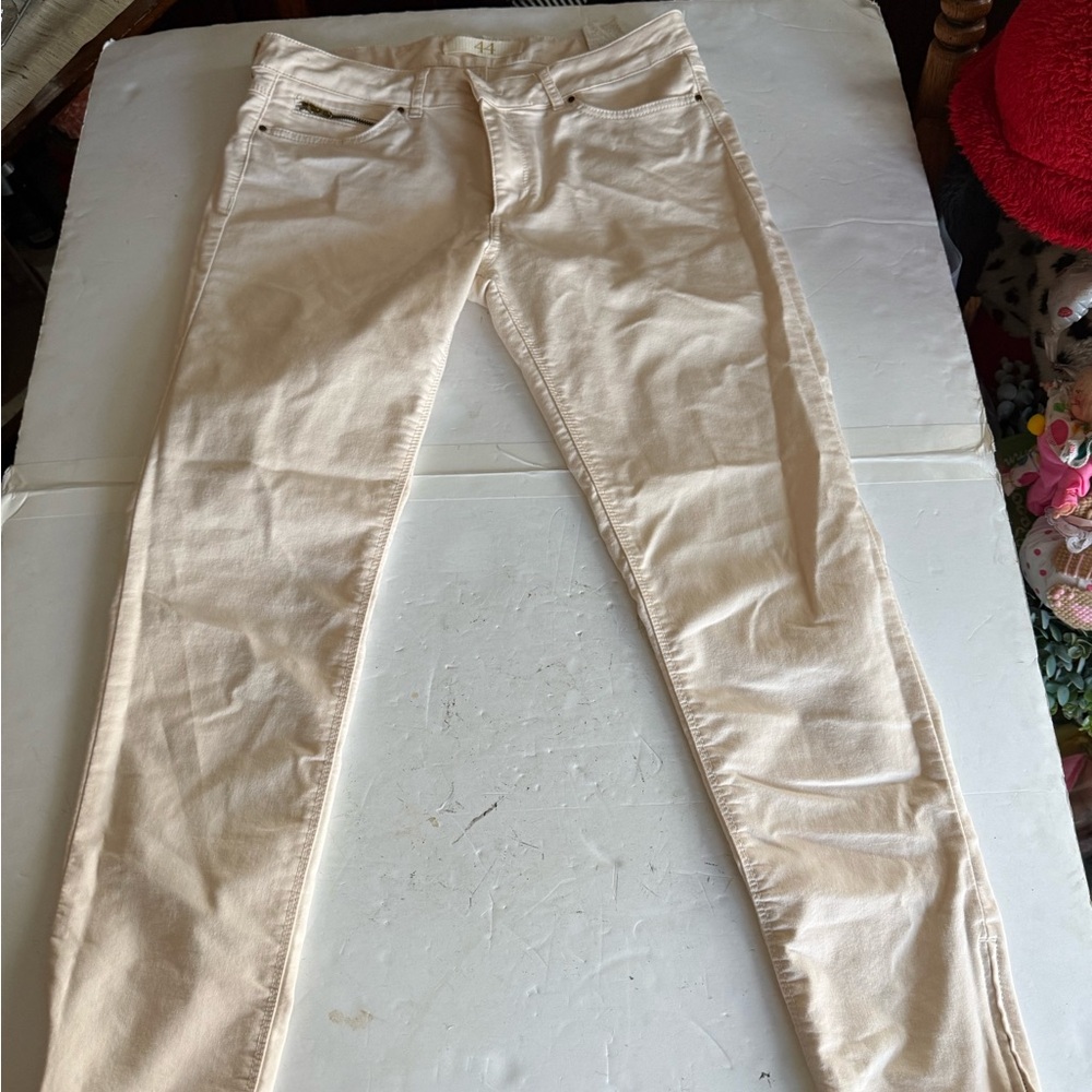 Cream Skinny Jeans with zip ankle